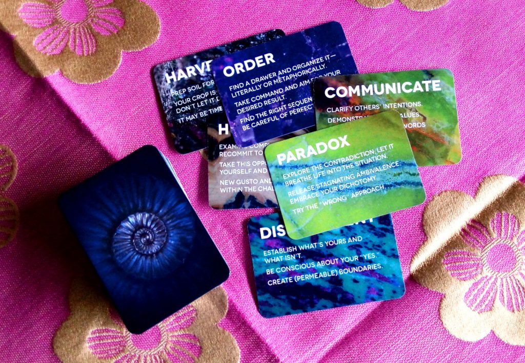 Several cards from The Sovereign Oracle deck